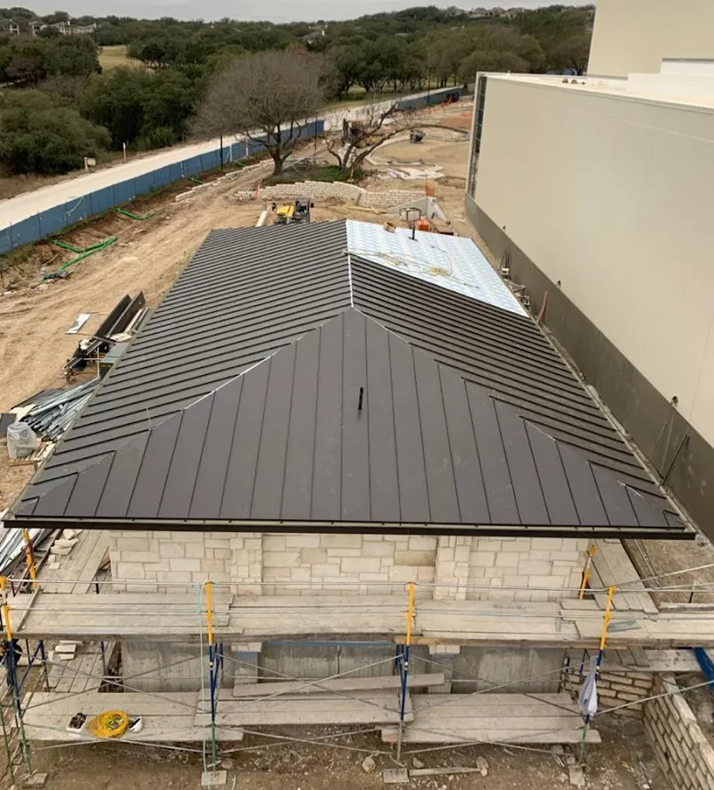 Metal roof new construction with scaffolding in Universal City